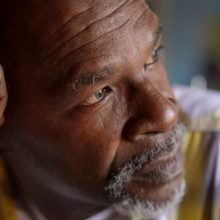 disinheriting a child, image of man deep in thought