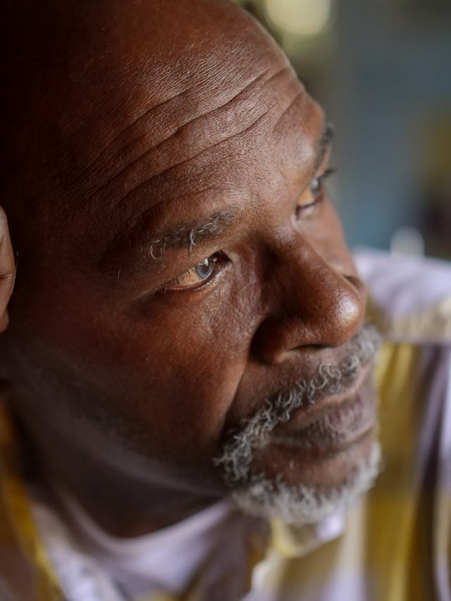 disinheriting a child, image of man deep in thought
